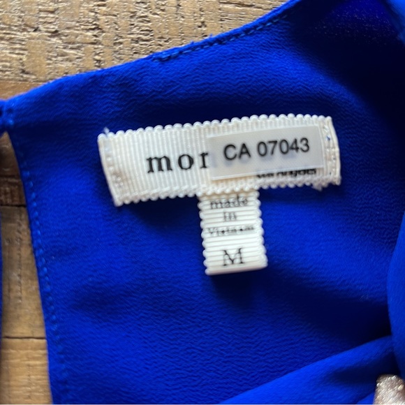 Blue blouse with asymmetrical detail - Picture 4 of 4